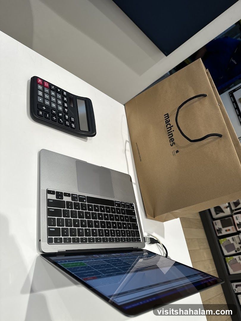 Apple Laptop and Calculator