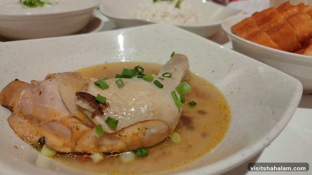 Chicken dish with rice and fried dough