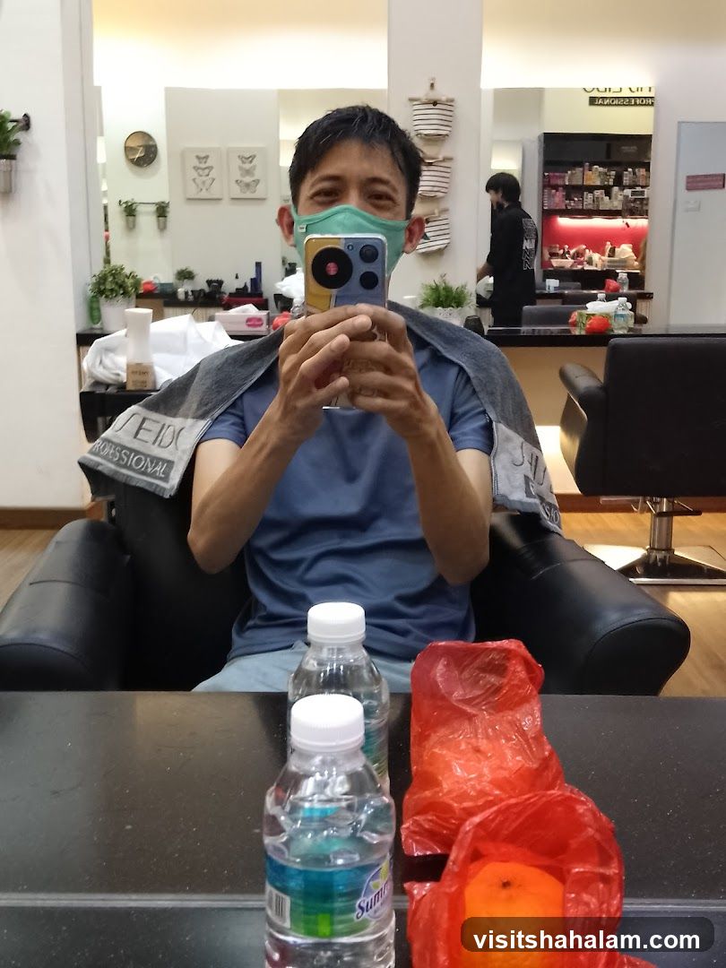 Man taking a selfie in a salon