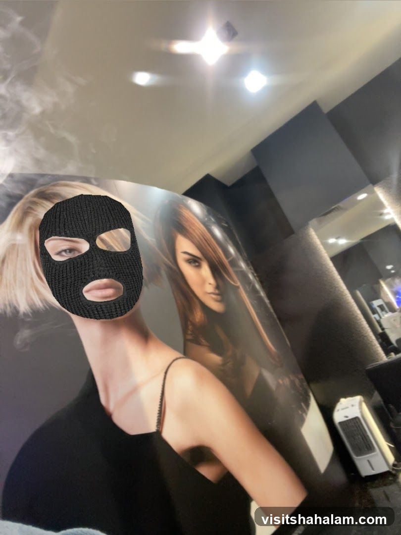 Woman in Balaclava Posing in Front of Hair Salon Posters