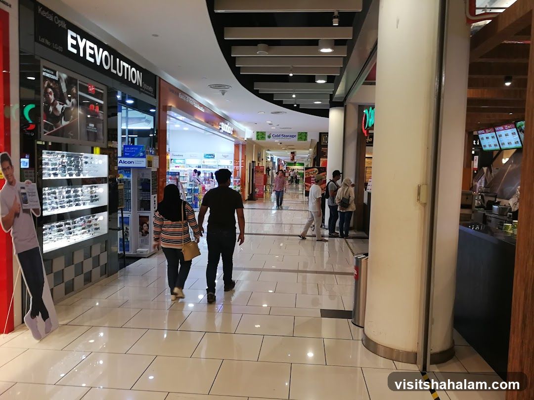 Mall Interior with Shops and People