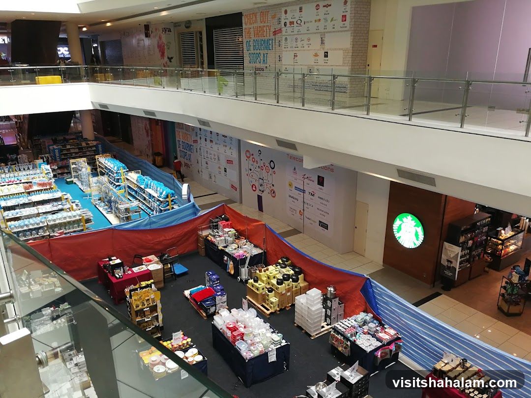 Mall Interior with Pop-Up Stalls and Starbucks