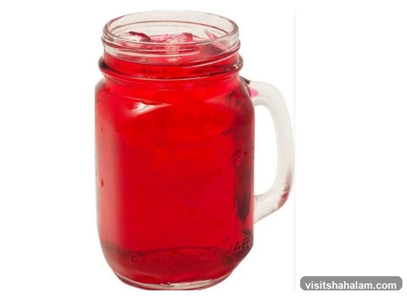 Red Drink in a Mason Jar