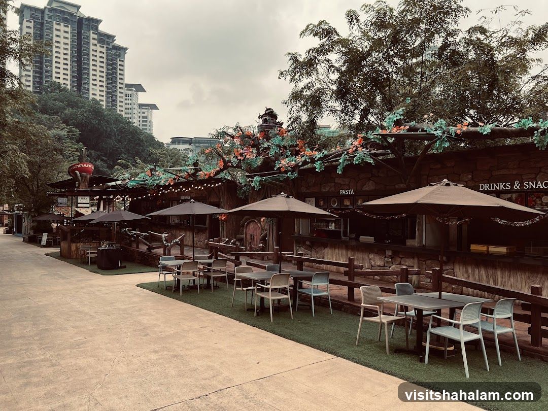 Outdoor dining area with rustic food stalls