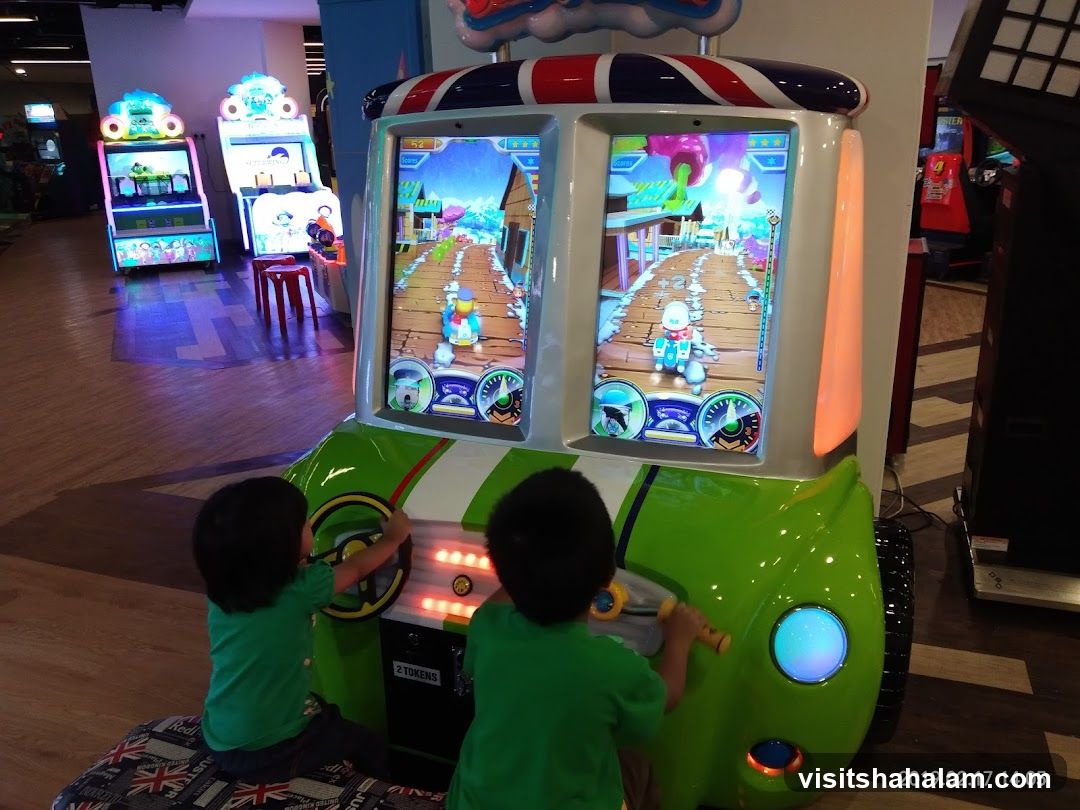 Children Playing an Arcade Game