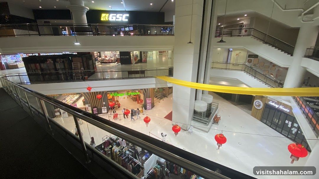 Mall Interior with Shops and Escalators