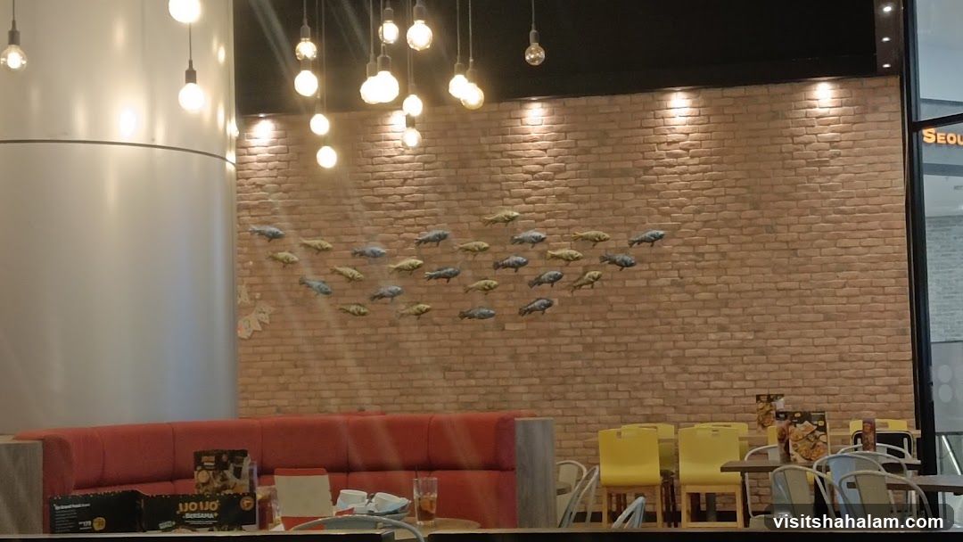 Restaurant Interior with Fish Wall Art