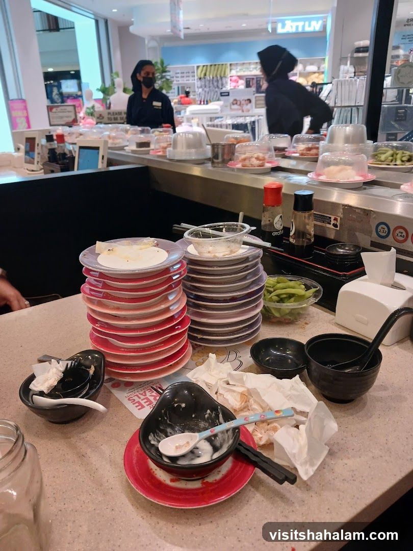 Messy table at a sushi restaurant