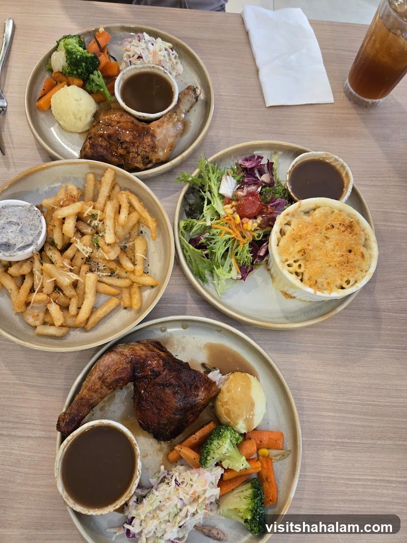 Three plates of food on a table