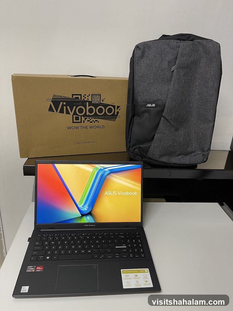 ASUS Vivobook Laptop with Backpack and Box