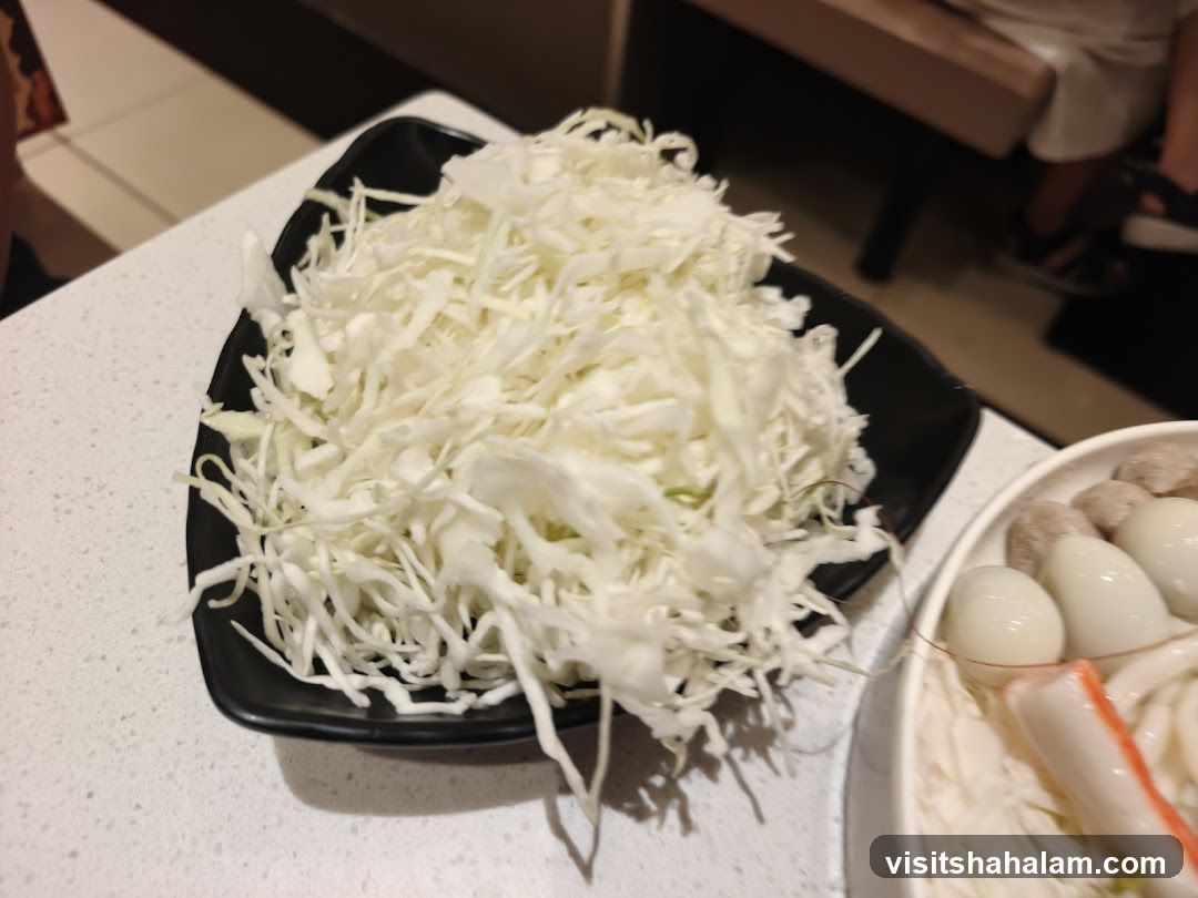 Shredded Cabbage and Hot Pot Ingredients