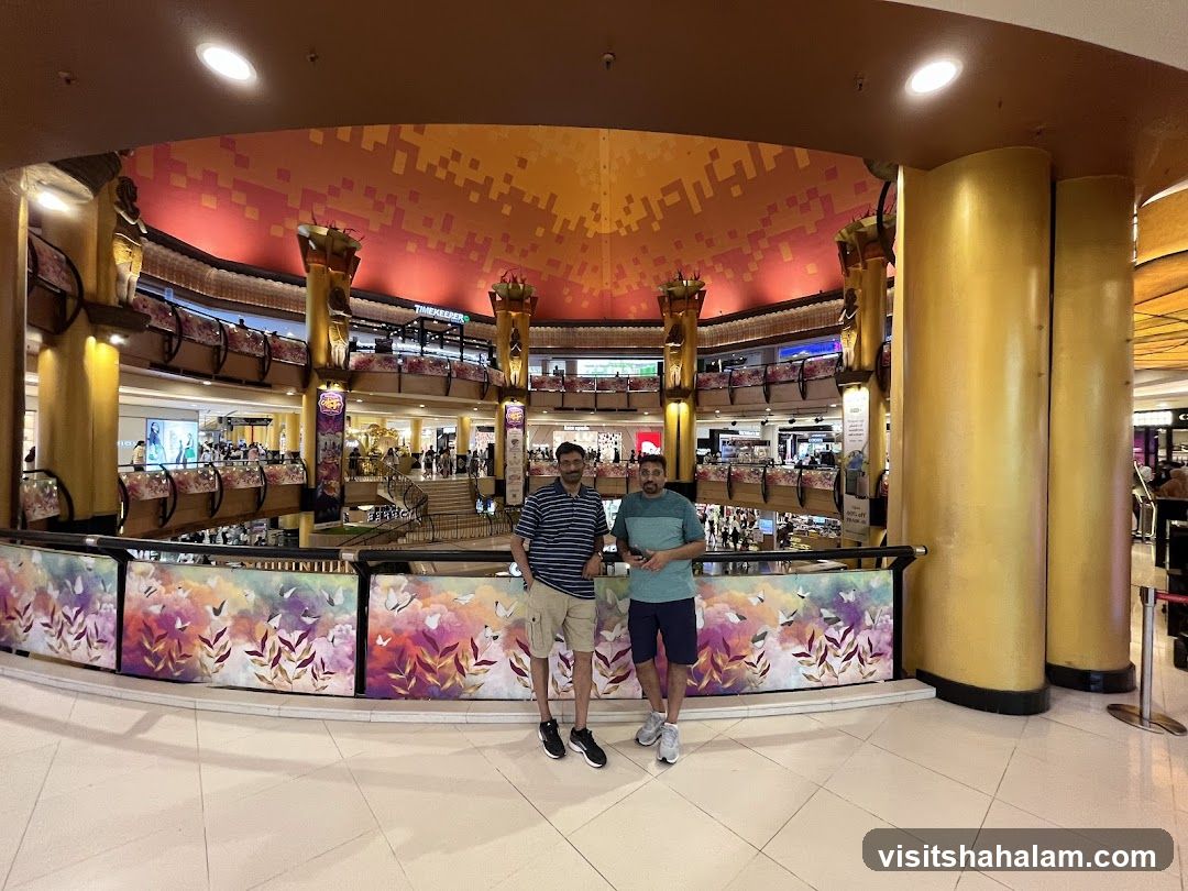 Two men posing in a shopping mall