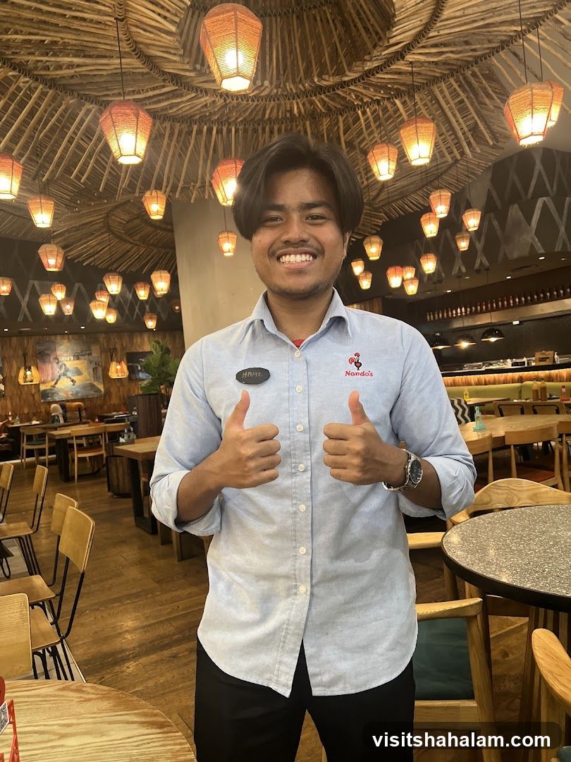 Staff member giving thumbs up