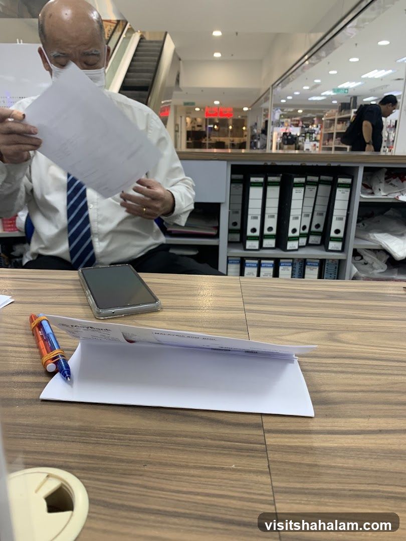 Man reviewing documents at a desk