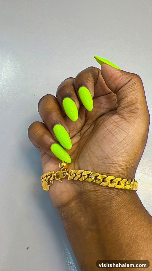Neon Green Nails and Gold Bracelet