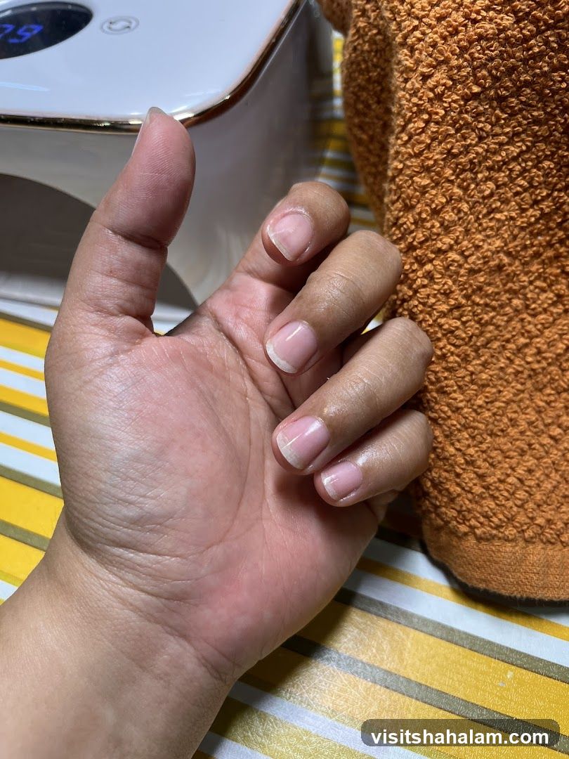Hand with freshly manicured nails