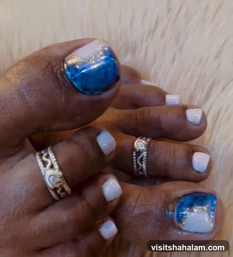 Pedicure with Blue and White Polish