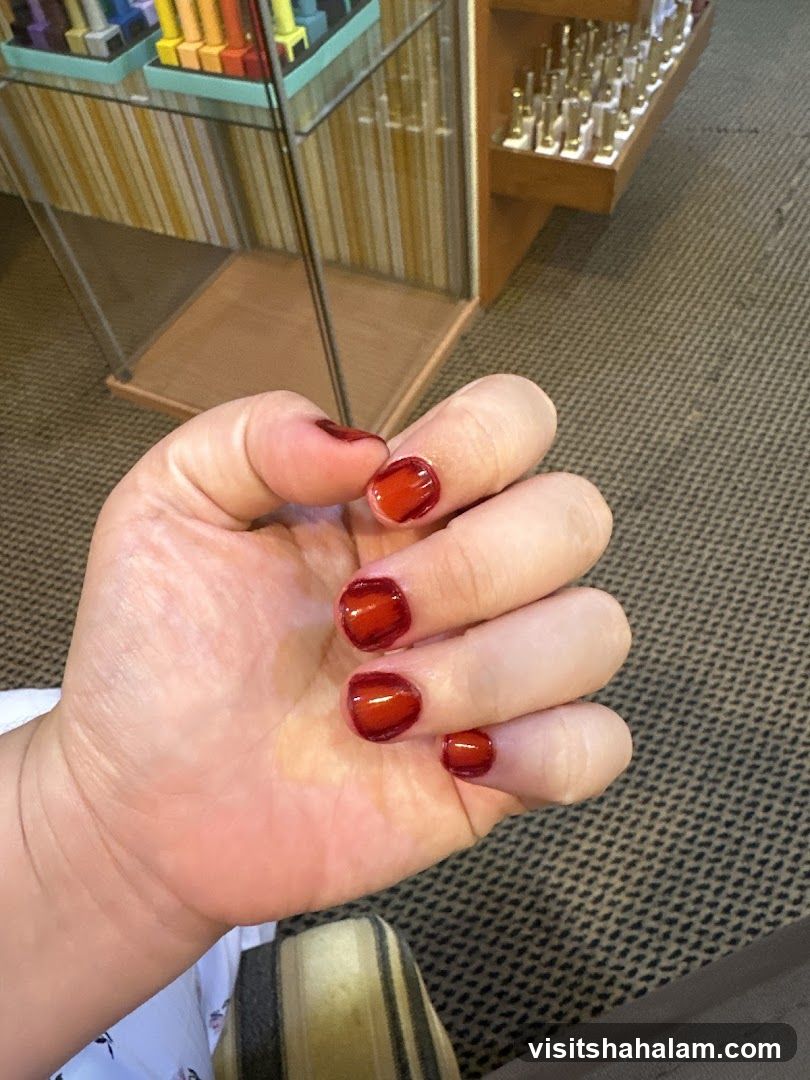 Hand with Red Nail Polish