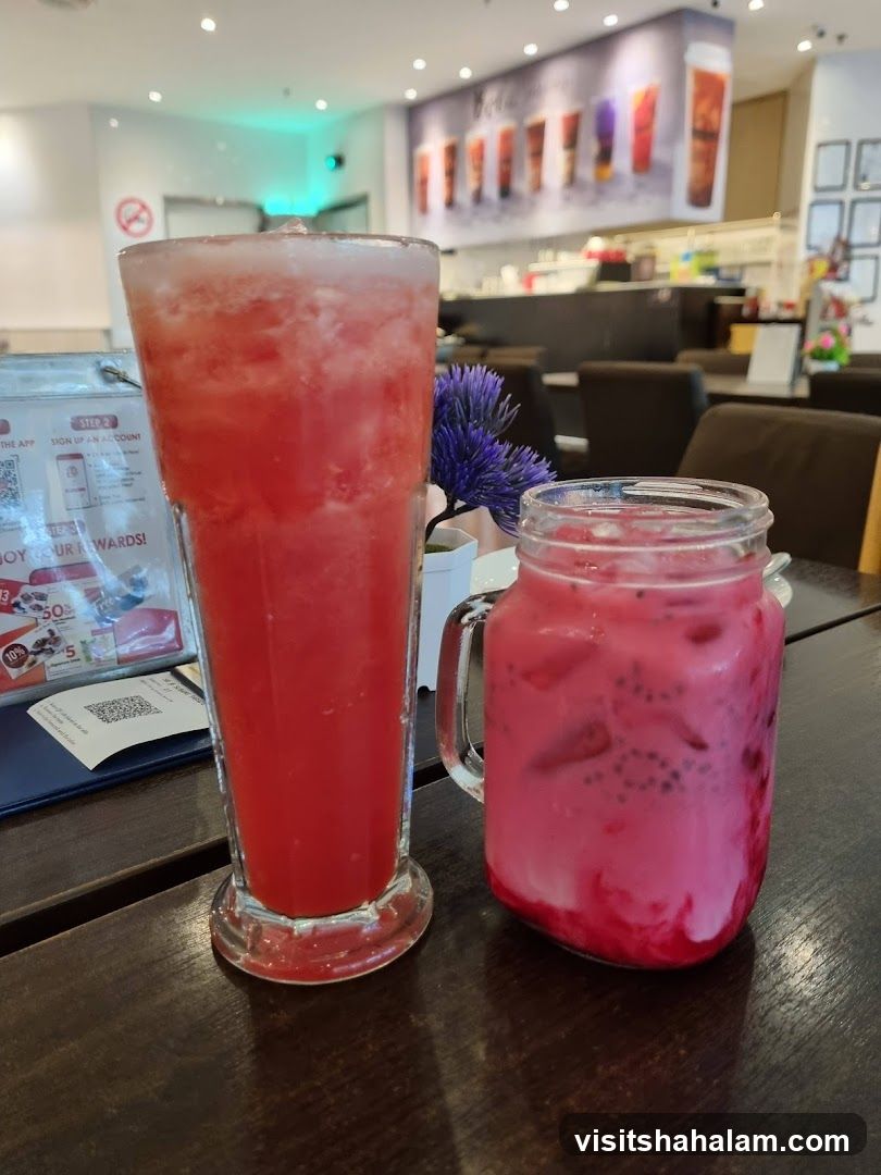 Two colorful drinks on a table