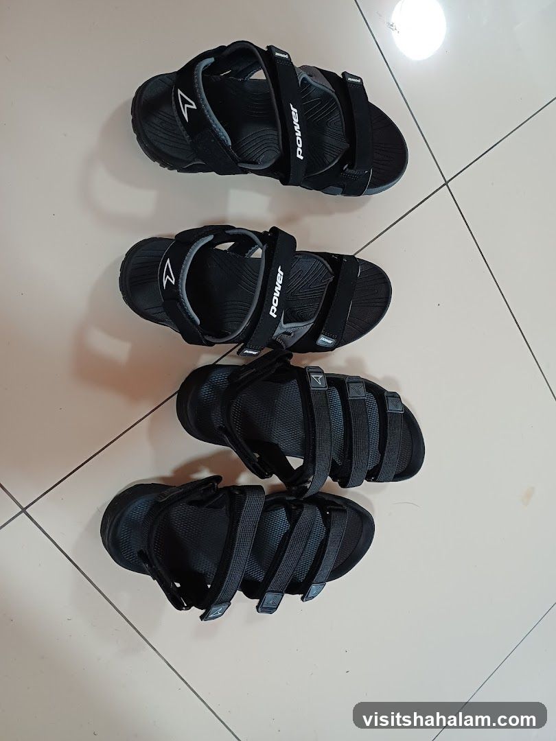 Four pairs of black sandals