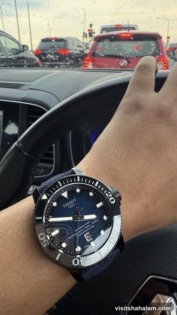Tissot Watch on Wrist in Traffic