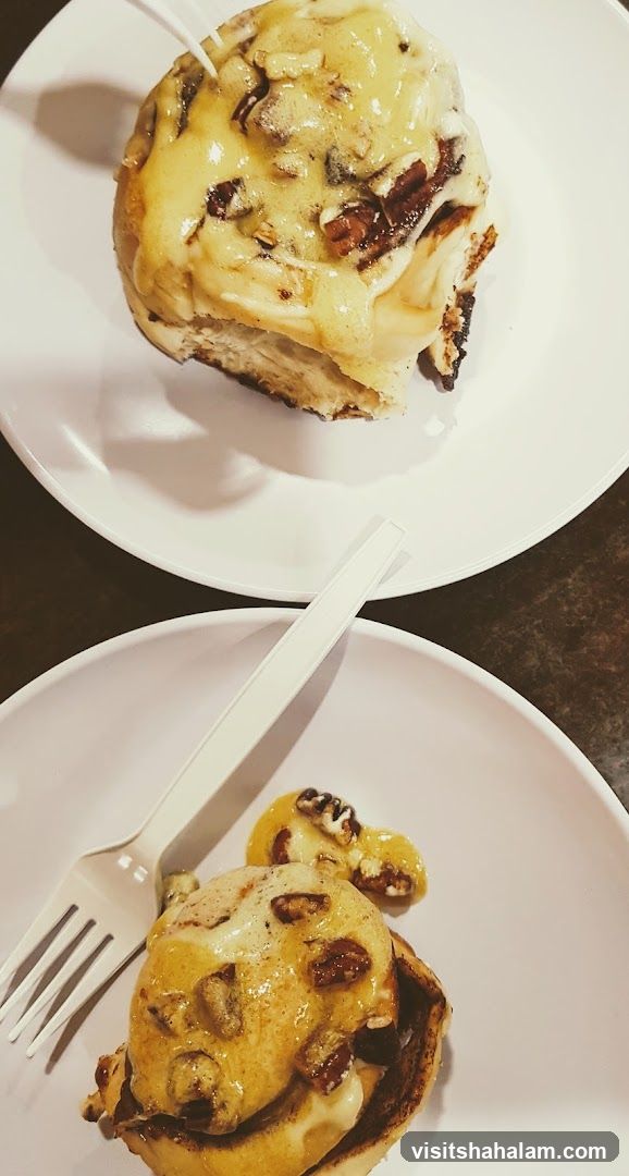 Two Cinnamon Rolls with Pecans and Glaze