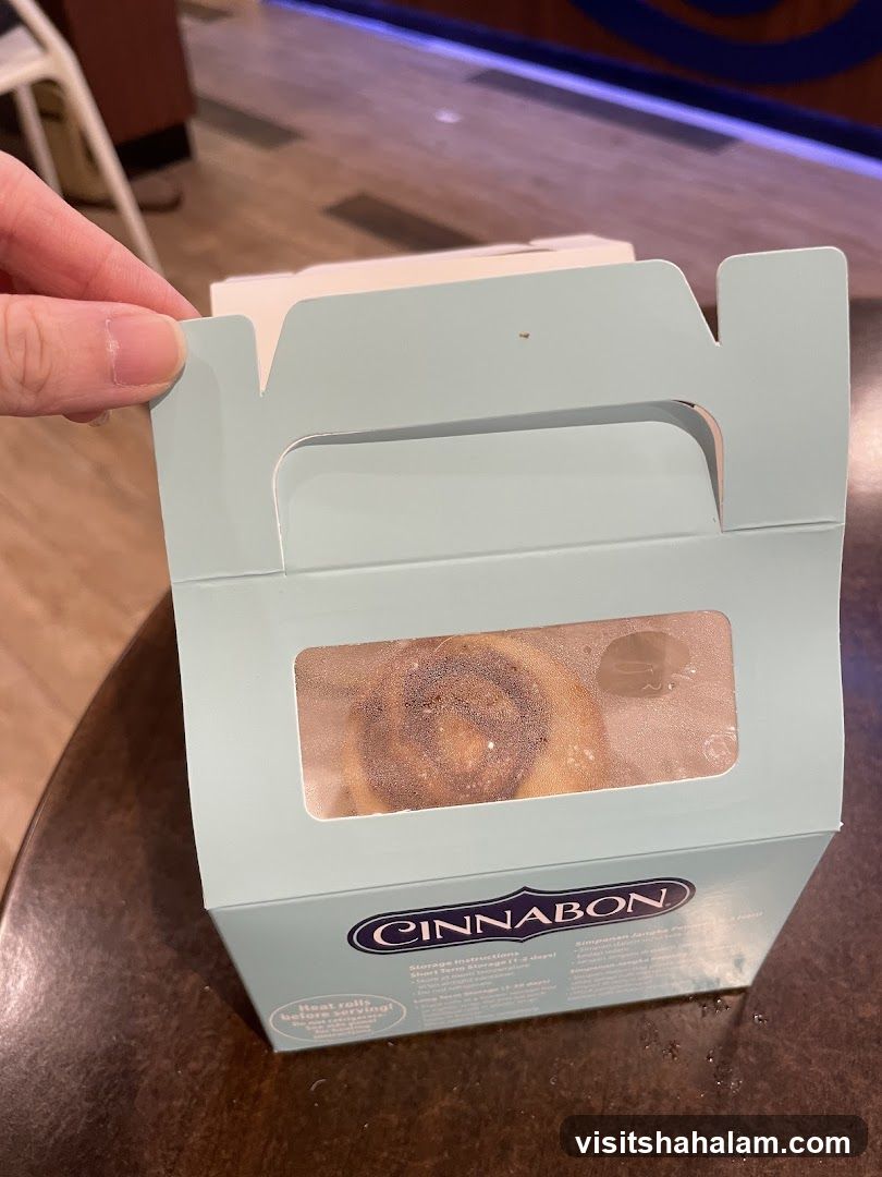 Cinnabon Box with Cinnamon Roll