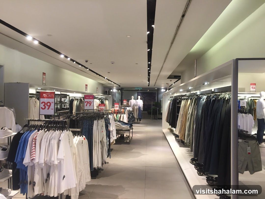 Clothing store interior with sale signs