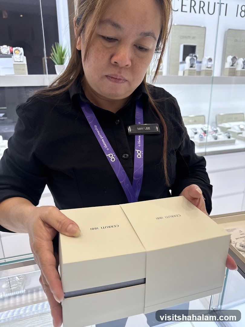 Sales Associate Holding a Cerruti 1881 Box