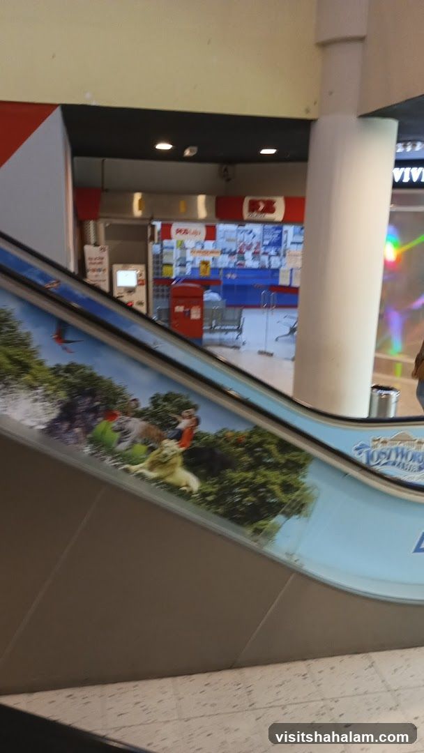 Escalator with animal graphics and shop interior