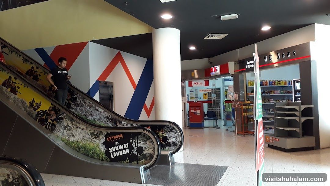 Mall Interior with Escalator and Shops