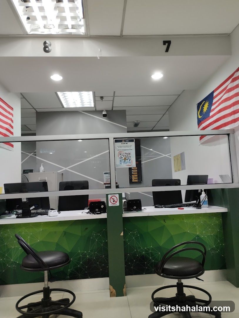 Service counter with computers and chairs