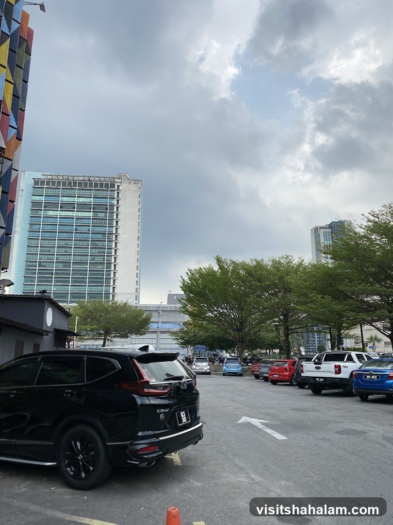 Parking Lot with Buildings and Cars