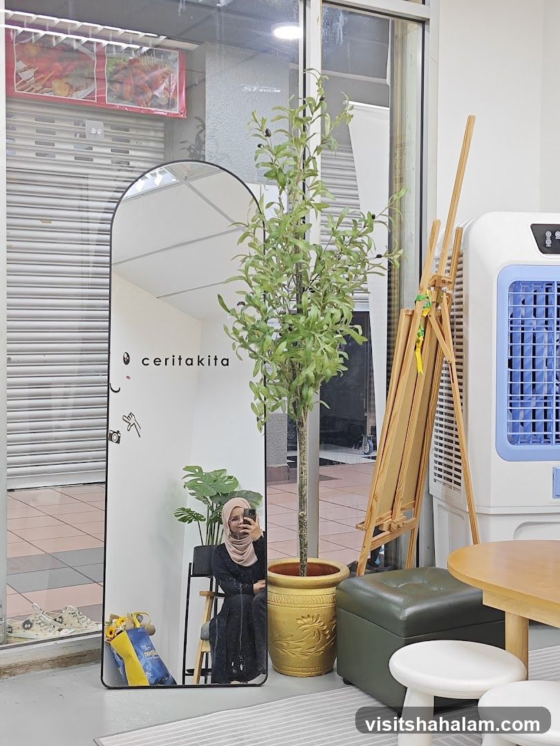Interior of a cafe with a mirror and plants