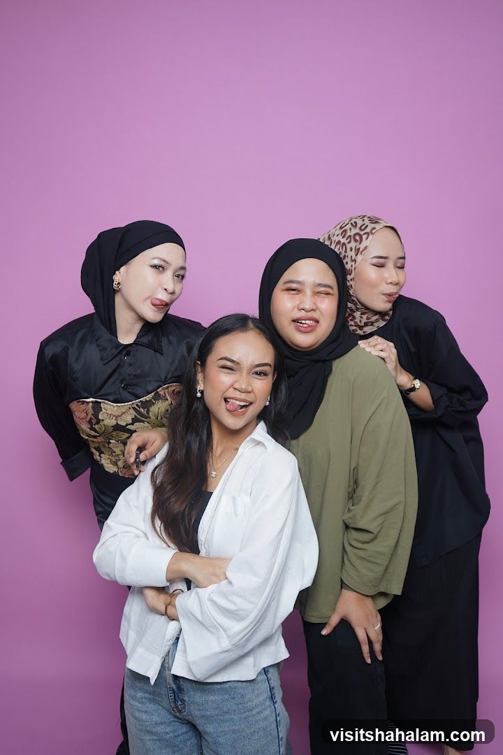 Four women posing for a photo
