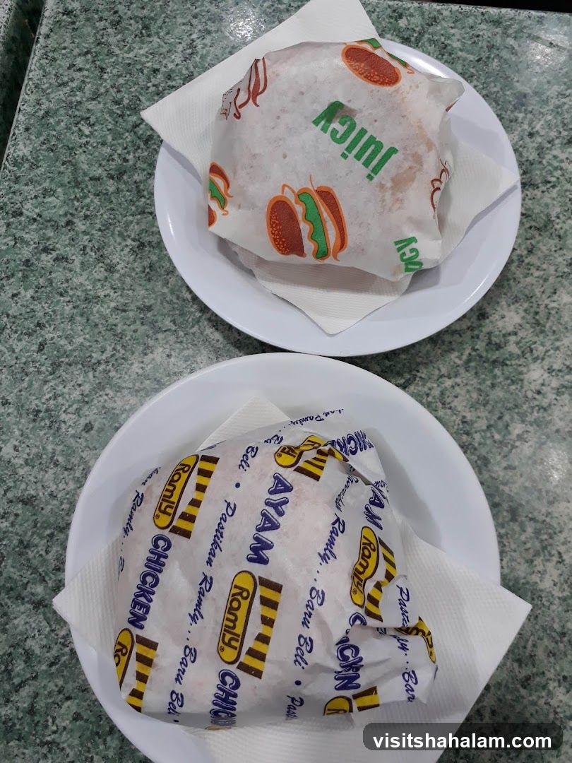 Two wrapped burgers