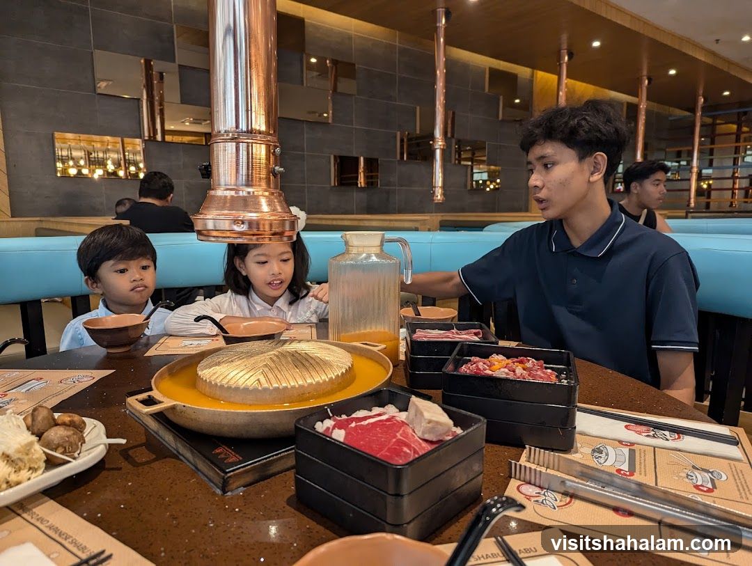 Family enjoying a meal at a restaurant