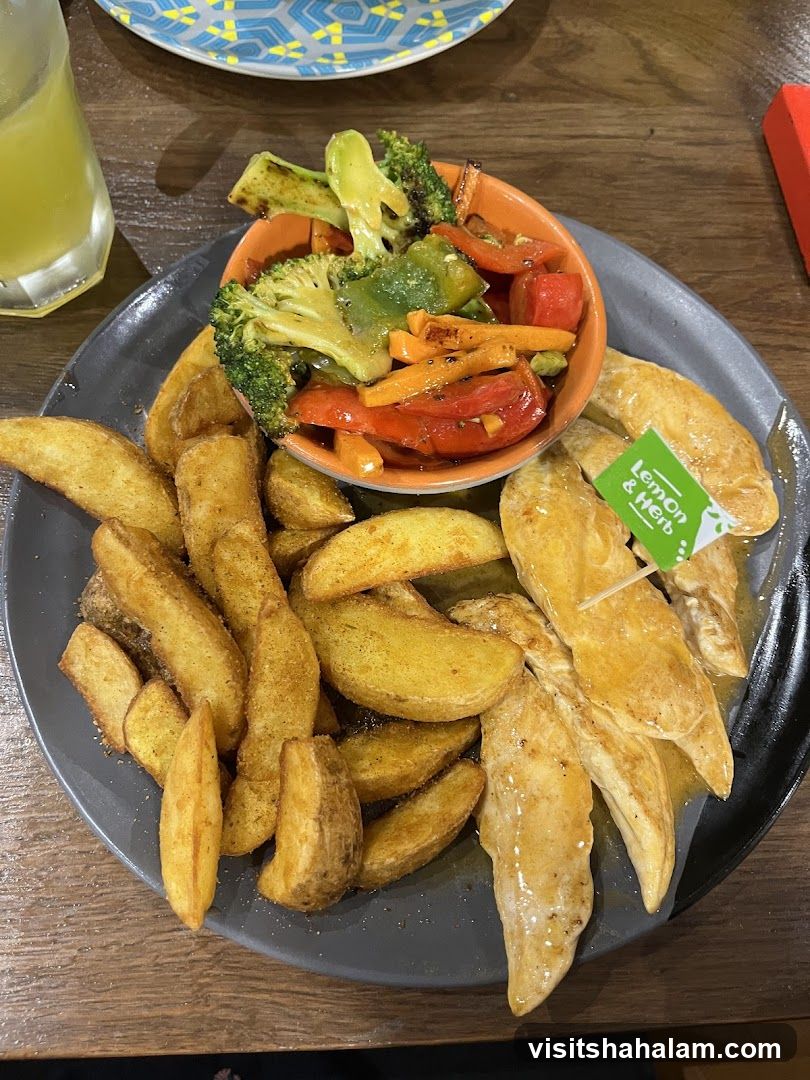 Chicken Strips with Potato Wedges and Vegetables