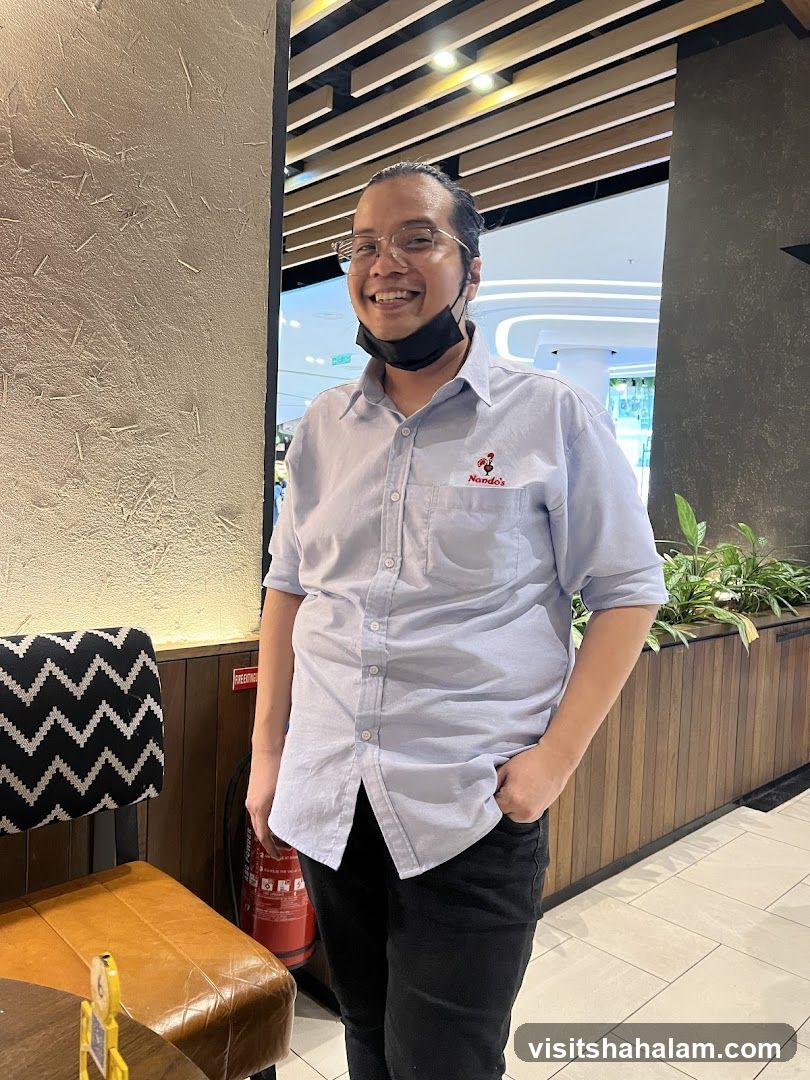 Man in Nando's Uniform