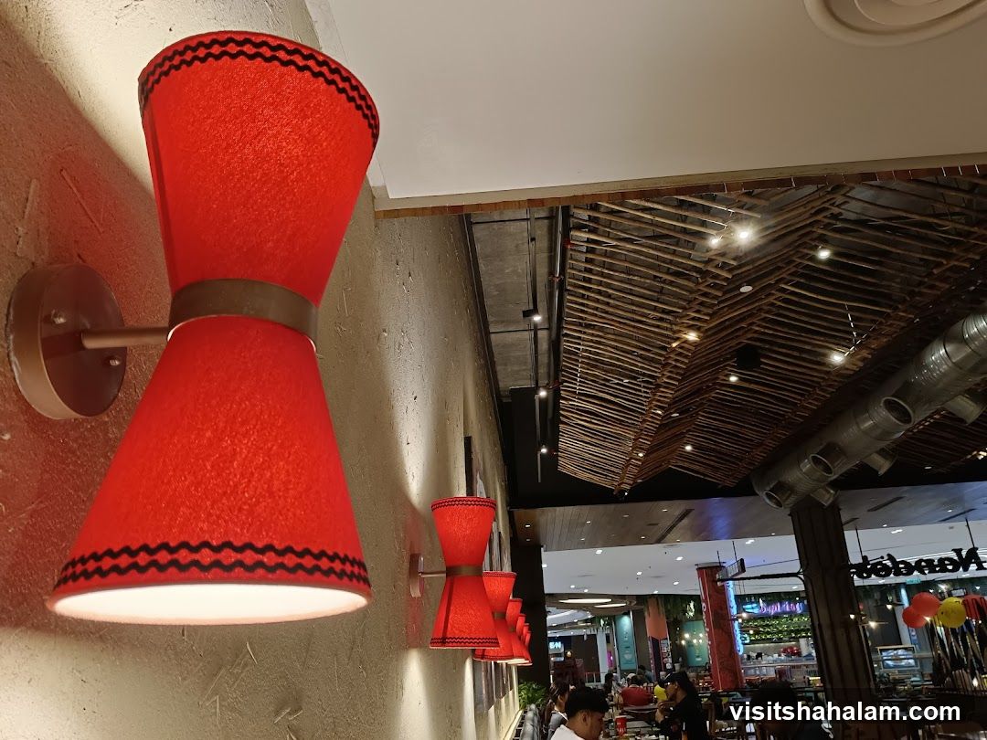 Restaurant Interior with Red Sconces