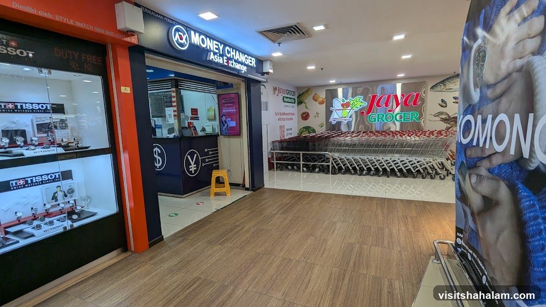 Money Changer and Grocery Store Entrance