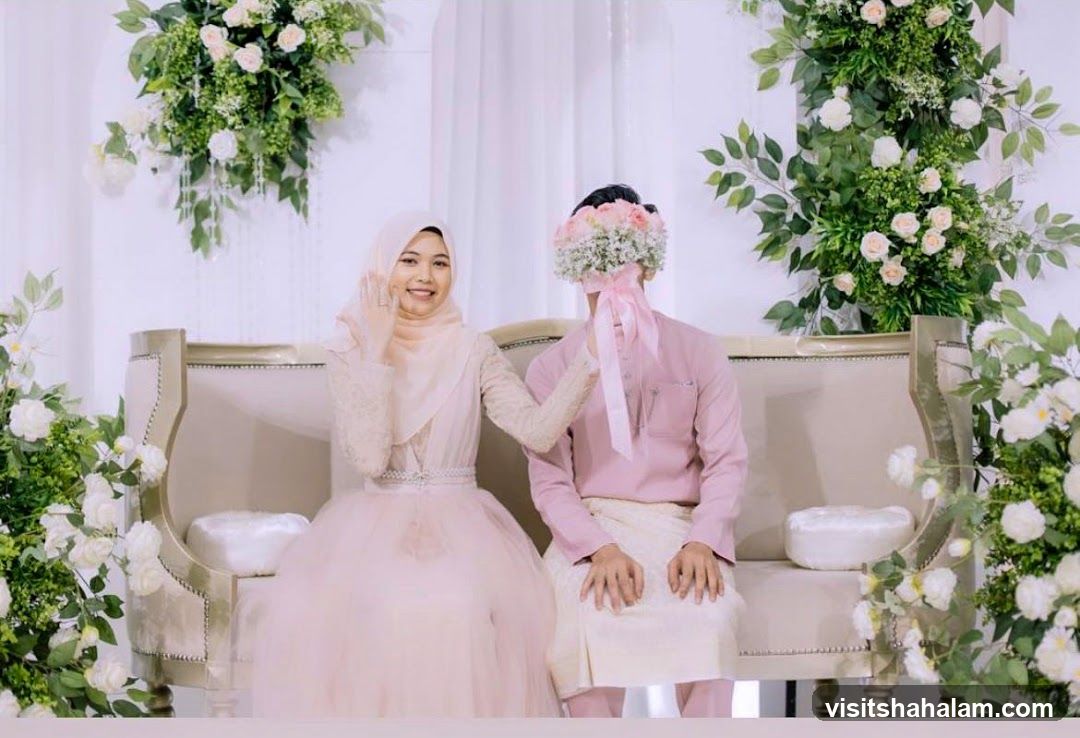 Wedding Couple Posing with Flowers