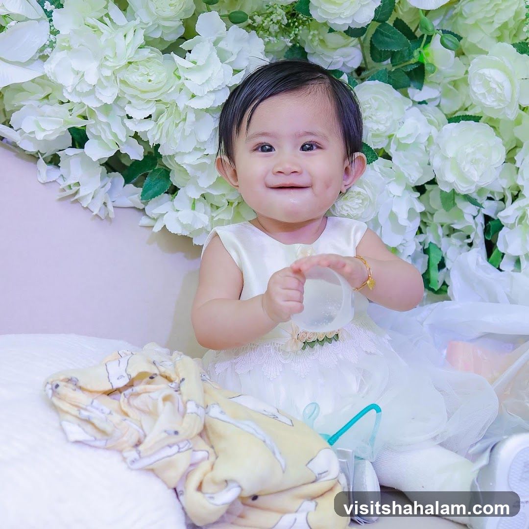Baby in a white dress