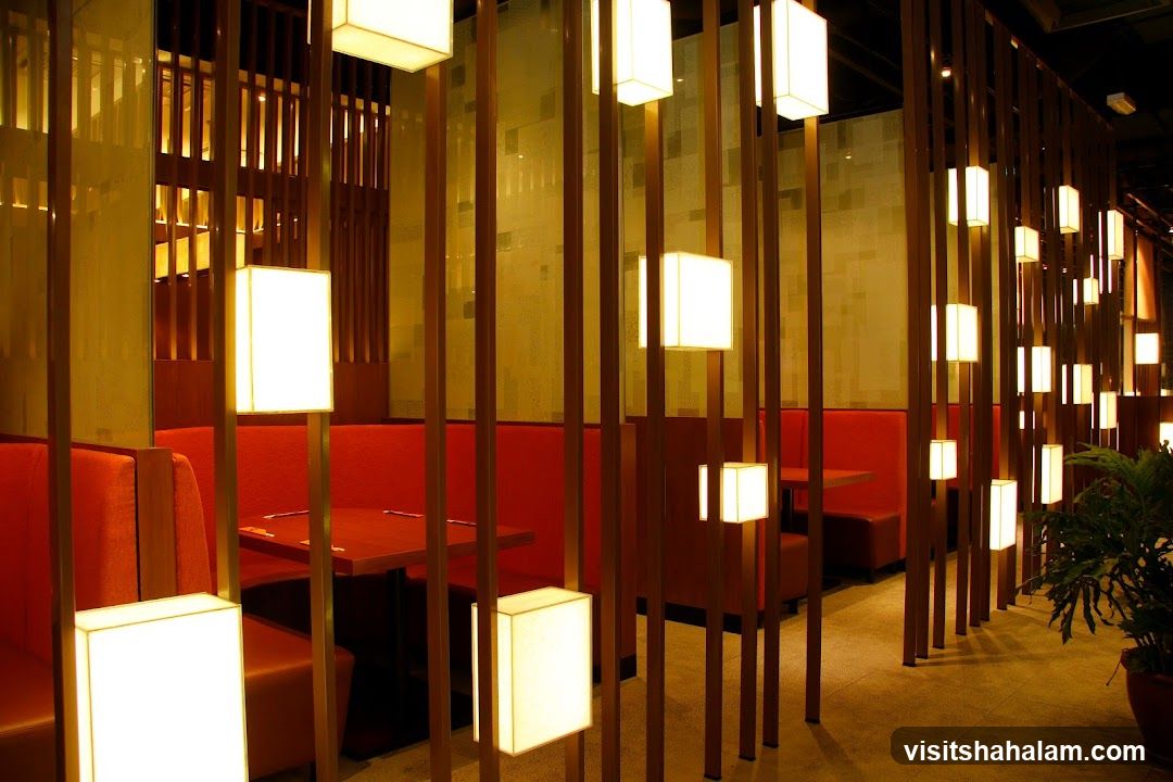 Restaurant Interior with Booth Seating and Modern Lighting