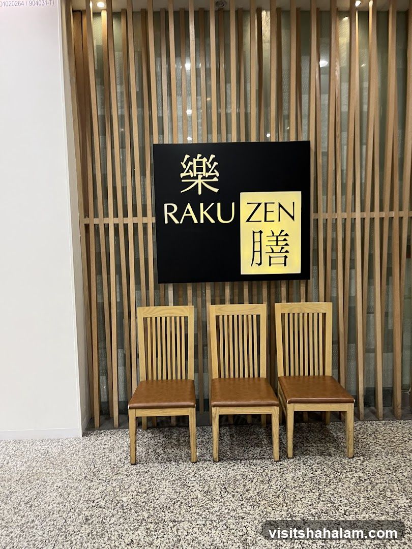 Chairs in front of Raku Zen sign