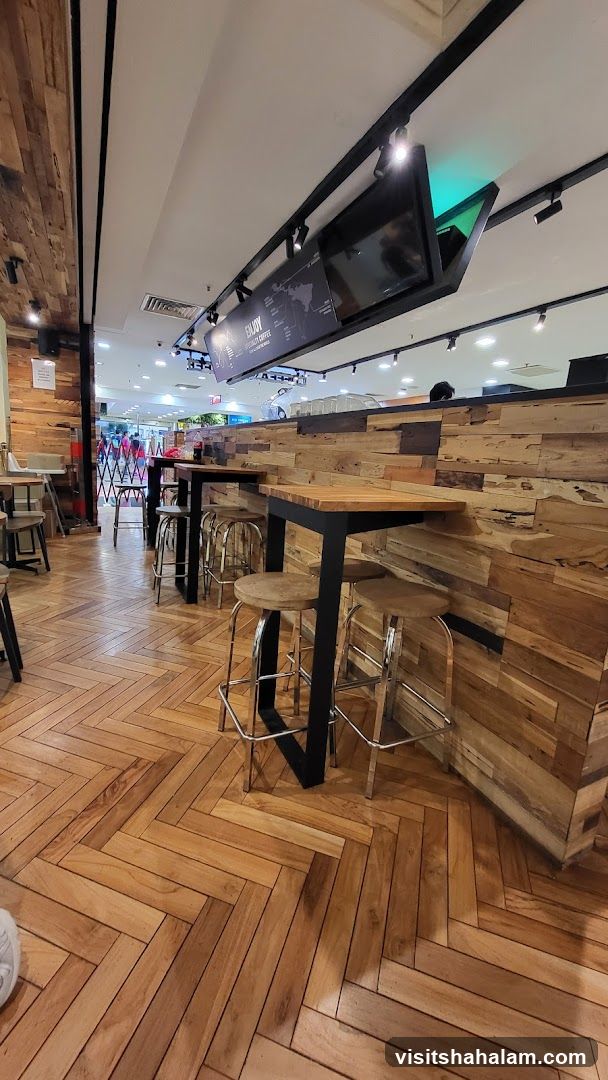 Cafe Interior with High Tables and Stools