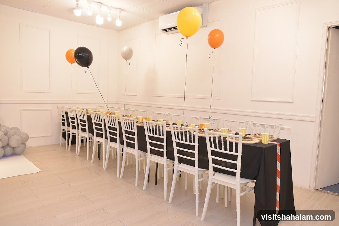 Party Setup with Balloons and Table Setting
