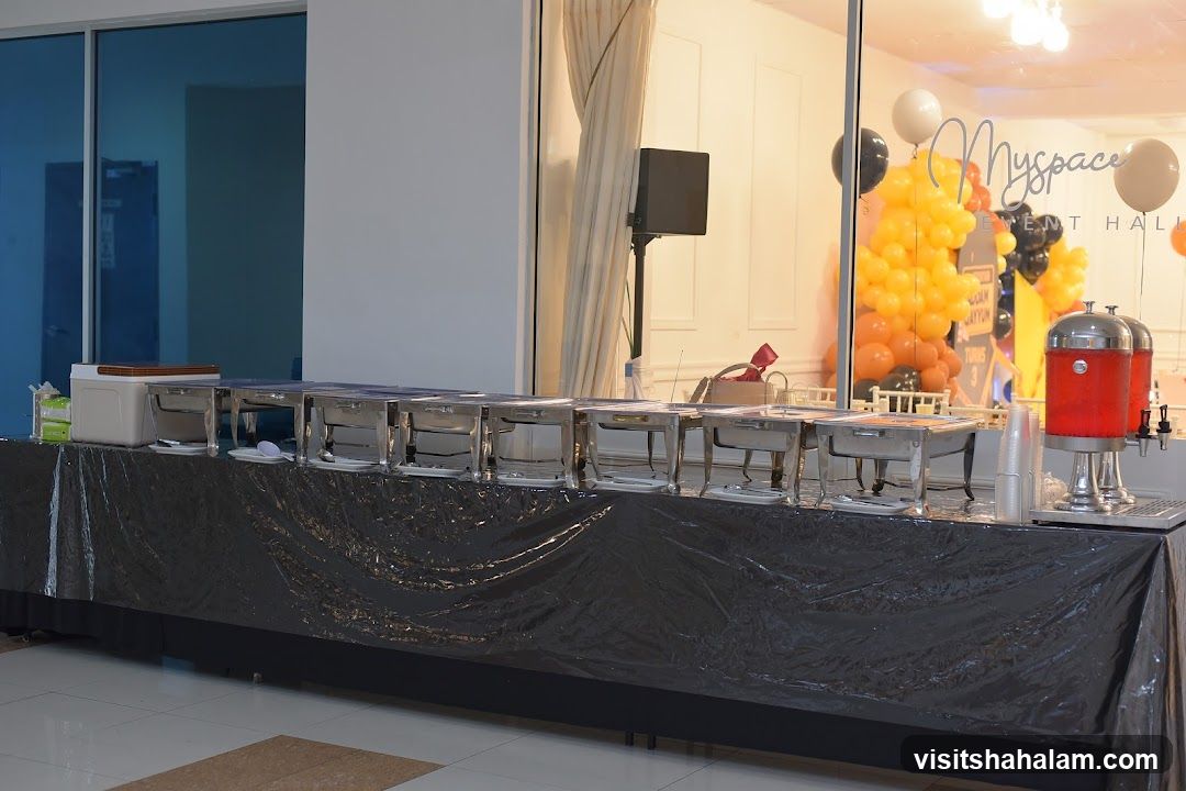 Buffet Setup with Chafing Dishes and Drink Dispensers