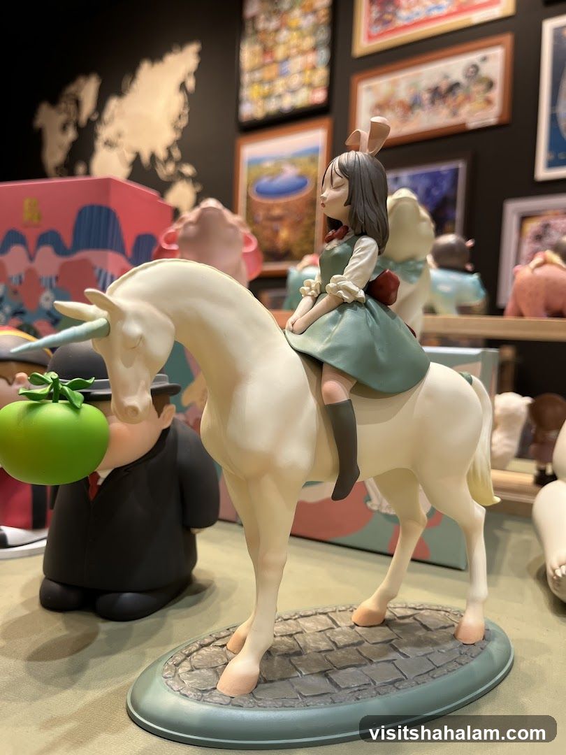 Figurine of a girl riding a unicorn