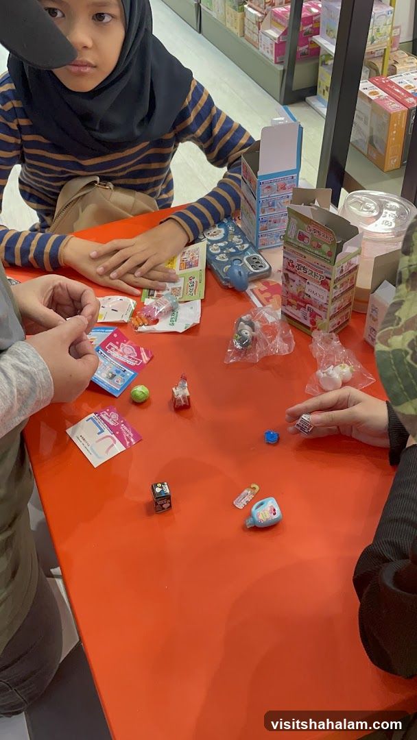 Children playing with toys on a table